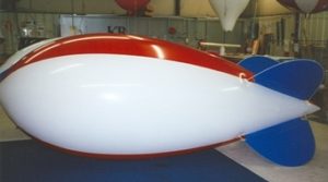 red, white, blue color helium advertising blimps for sale in Belton” width=